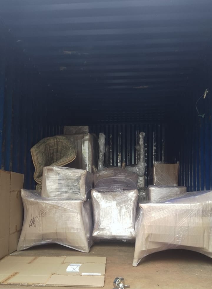 Fragile kitchenware being packed with care